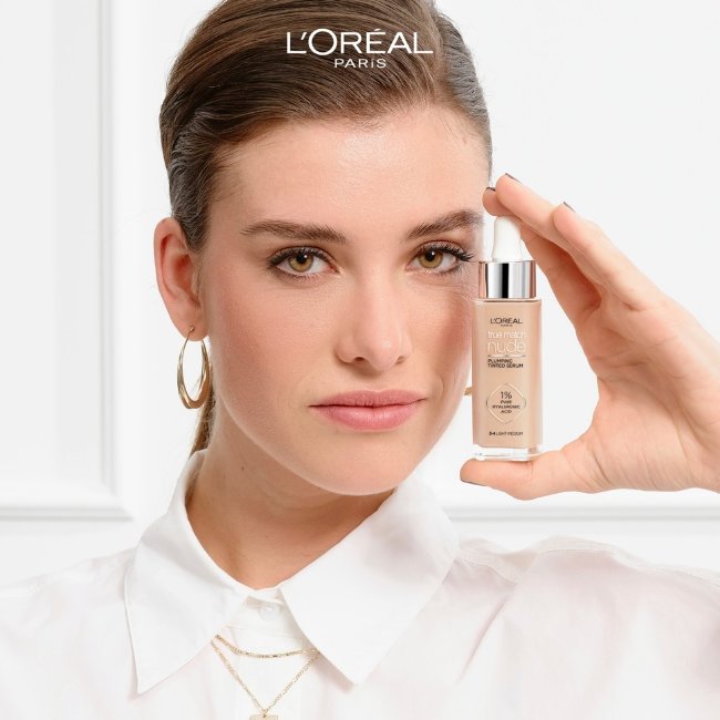 Тональный крем-сыворотка L'Oréal Paris True Match Nude Plumping 3-4 Light-Medium 30 мл Тональный крем-сыворотка L'Oréal Paris True Match Nude Plumping 3-4 Light-Medium 30 мл